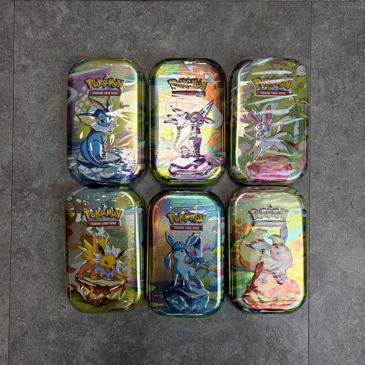 Pokemon Prismatic Evolutions Mini Tins