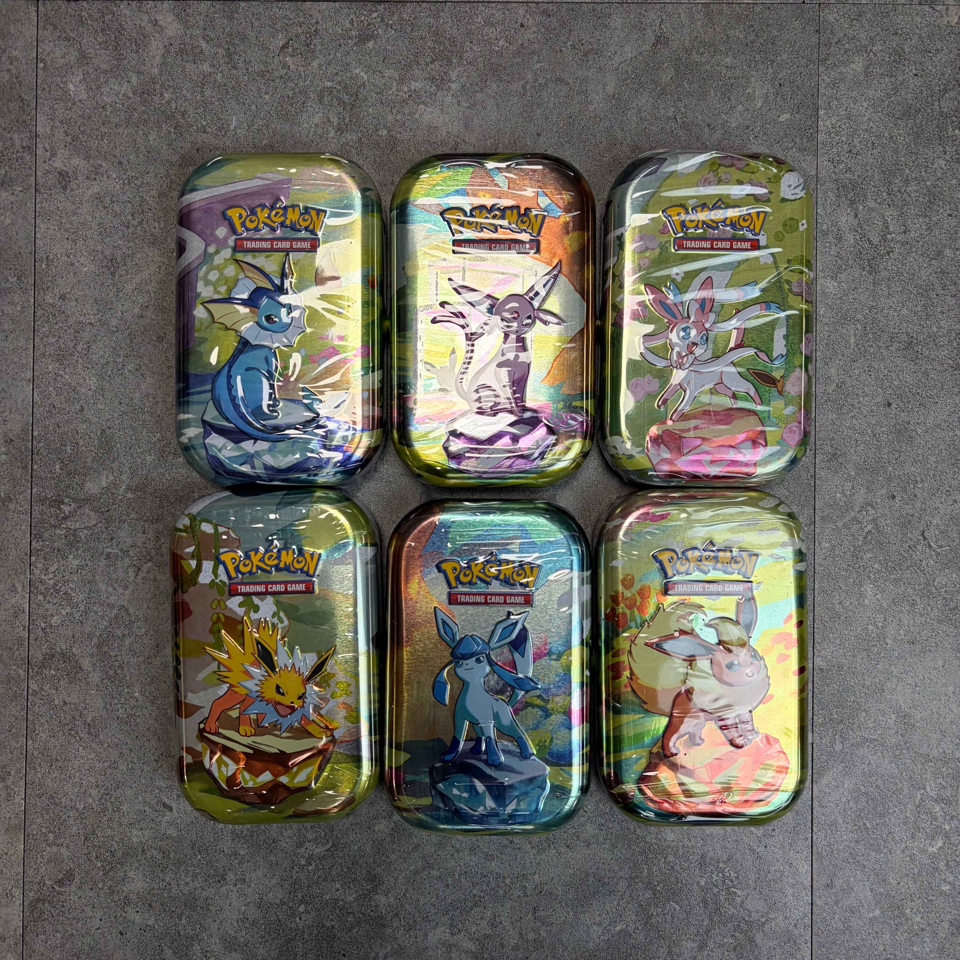 Pokemon Prismatic Evolutions Mini Tins